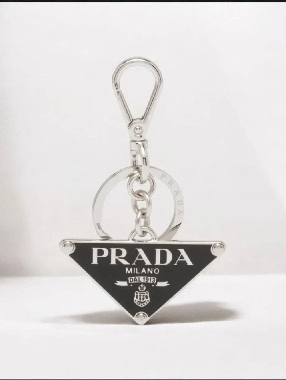 Prada triangle logo